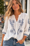 Cara embroidered tunic blouse